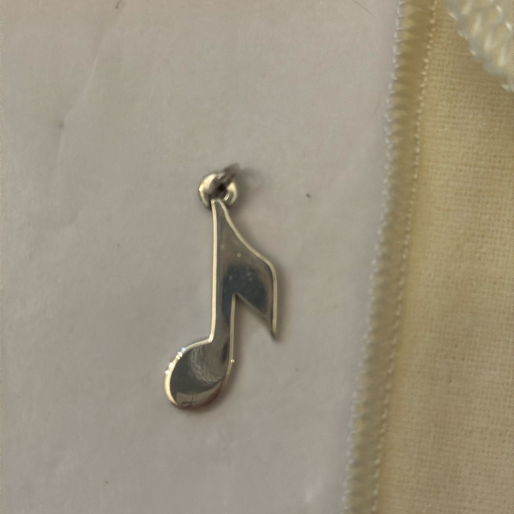 Retired Music Note Charm
